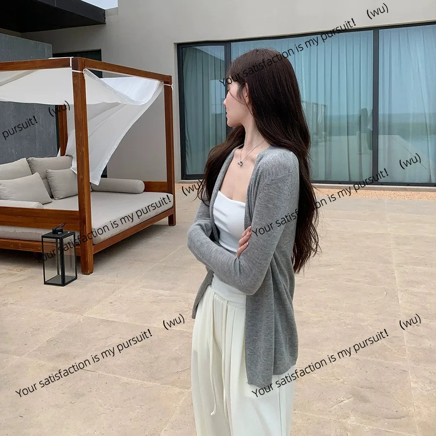 

Lazy wind solid color knitted cardigan women's 2025 spring and summer coat thin medium and long outer cardigan sunscreen top
