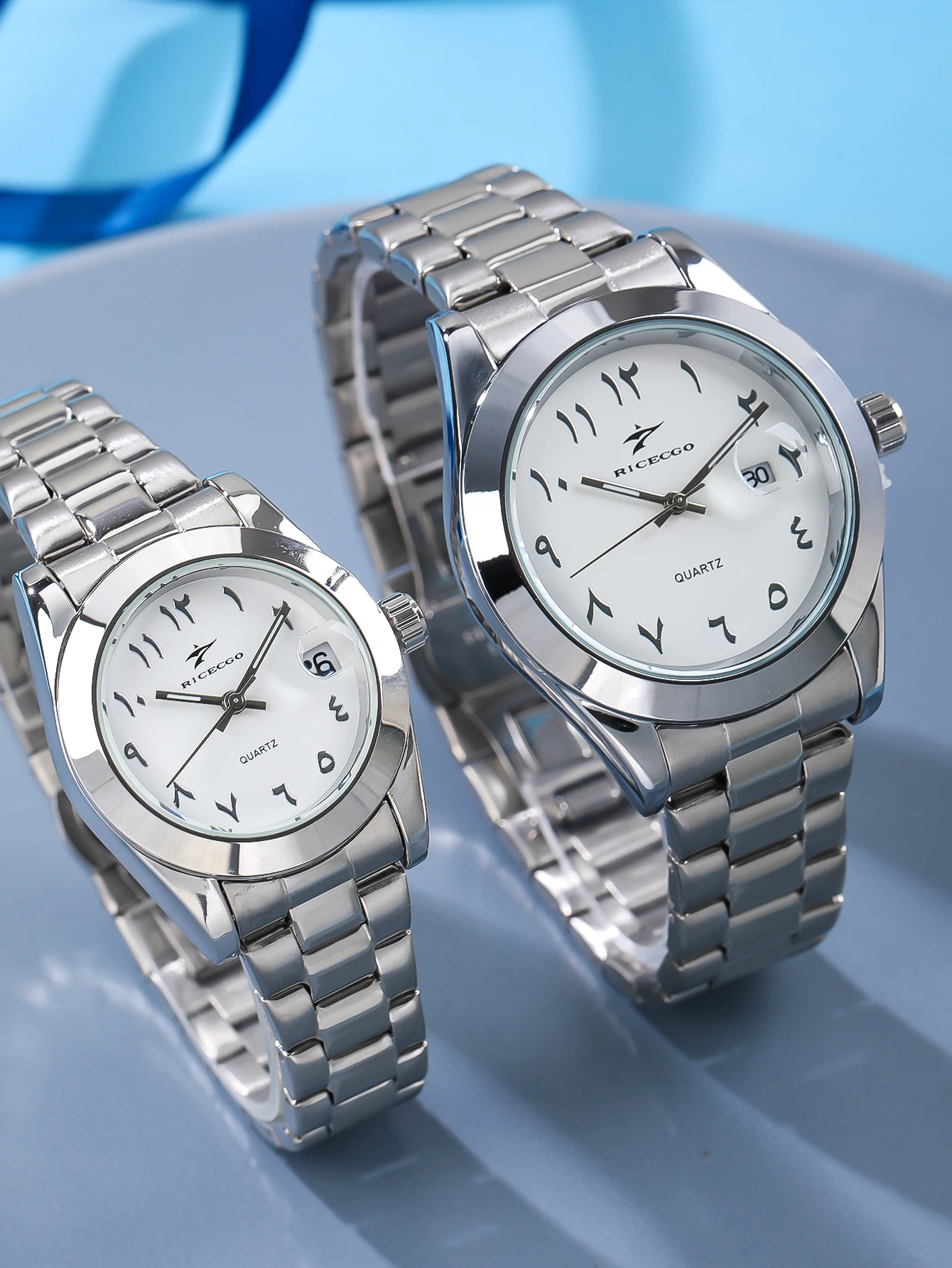 

RICECGO couple watch, one man and one woman, light luxury calendar pointer, luminous steel strip quartz watch, business commutin