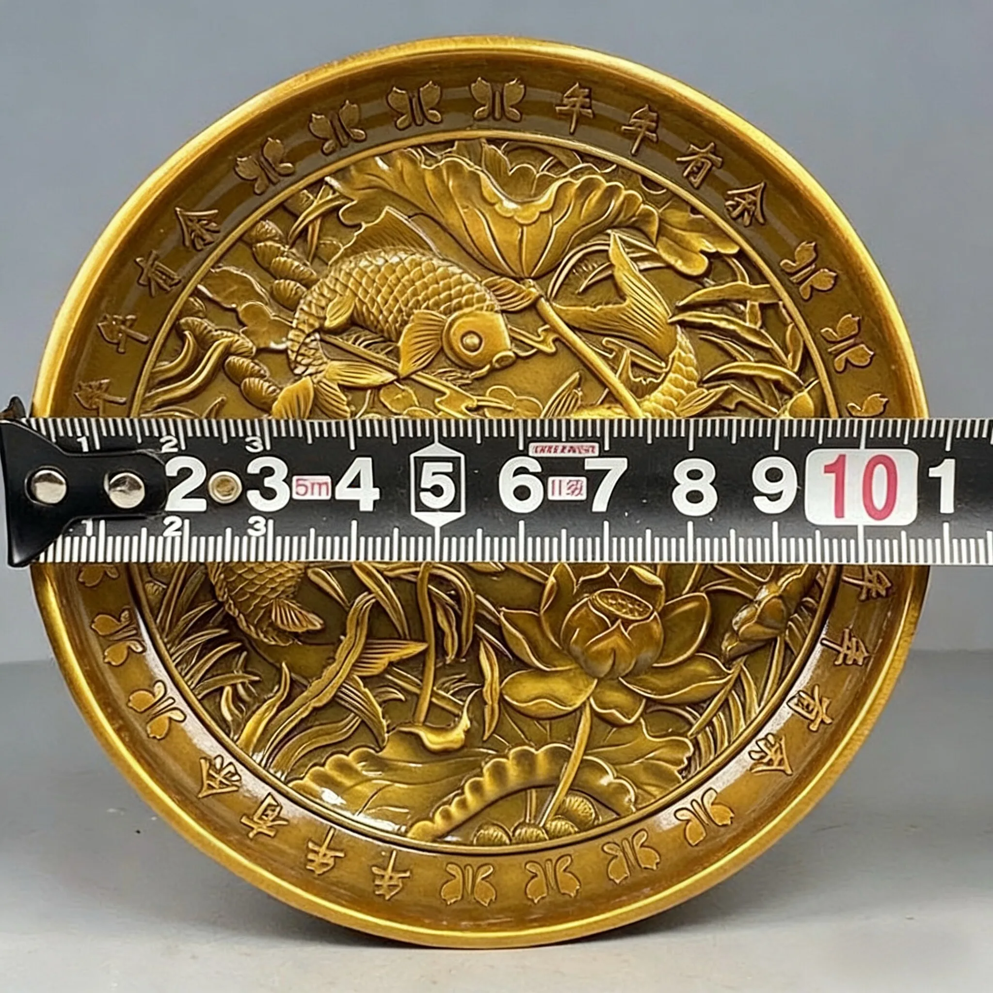 Double-sided three-dimensional relief alloy copper has more than enough lotus plate every year, retro brass Kowloon fish plate o