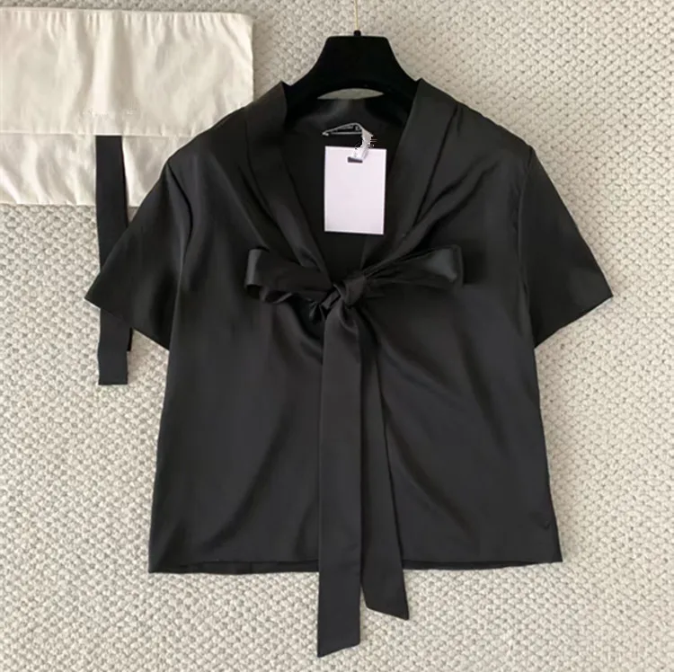 Personalización: Nuevos estilos de verano para ropa de mujer, Europa y América 2026, blusa de manga corta con cuello de lazo, camisa de color liso