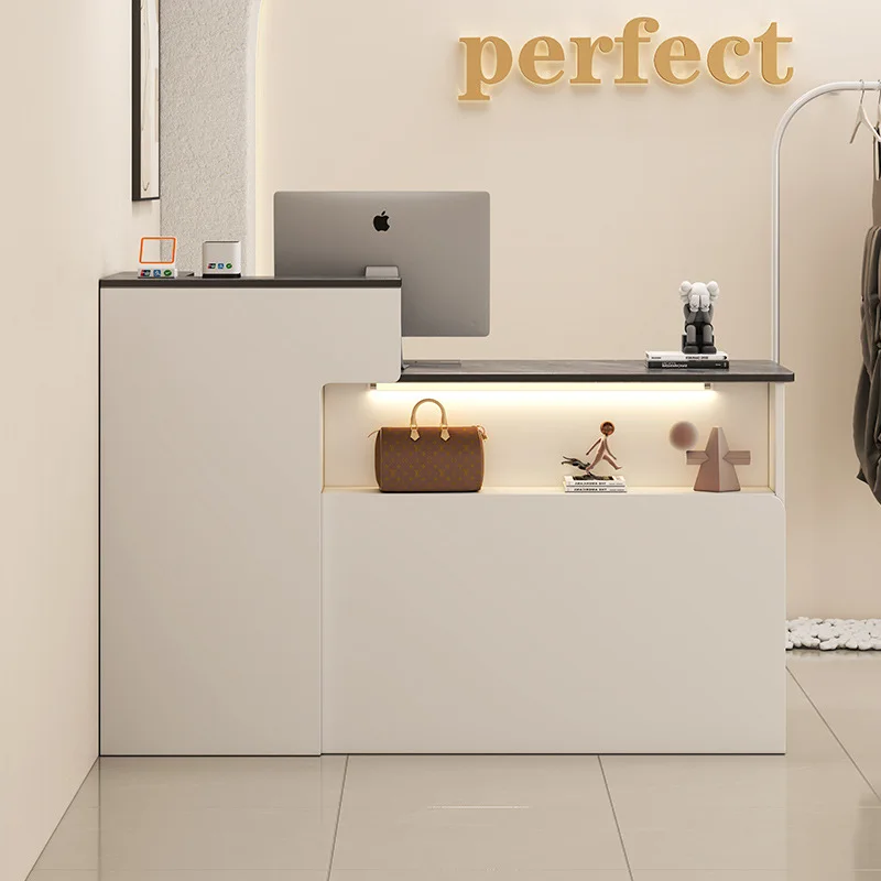 

Bar checkout page Front desk Clothing store Women's clothing store Small counter table Simple modern beauty salon table Receptio