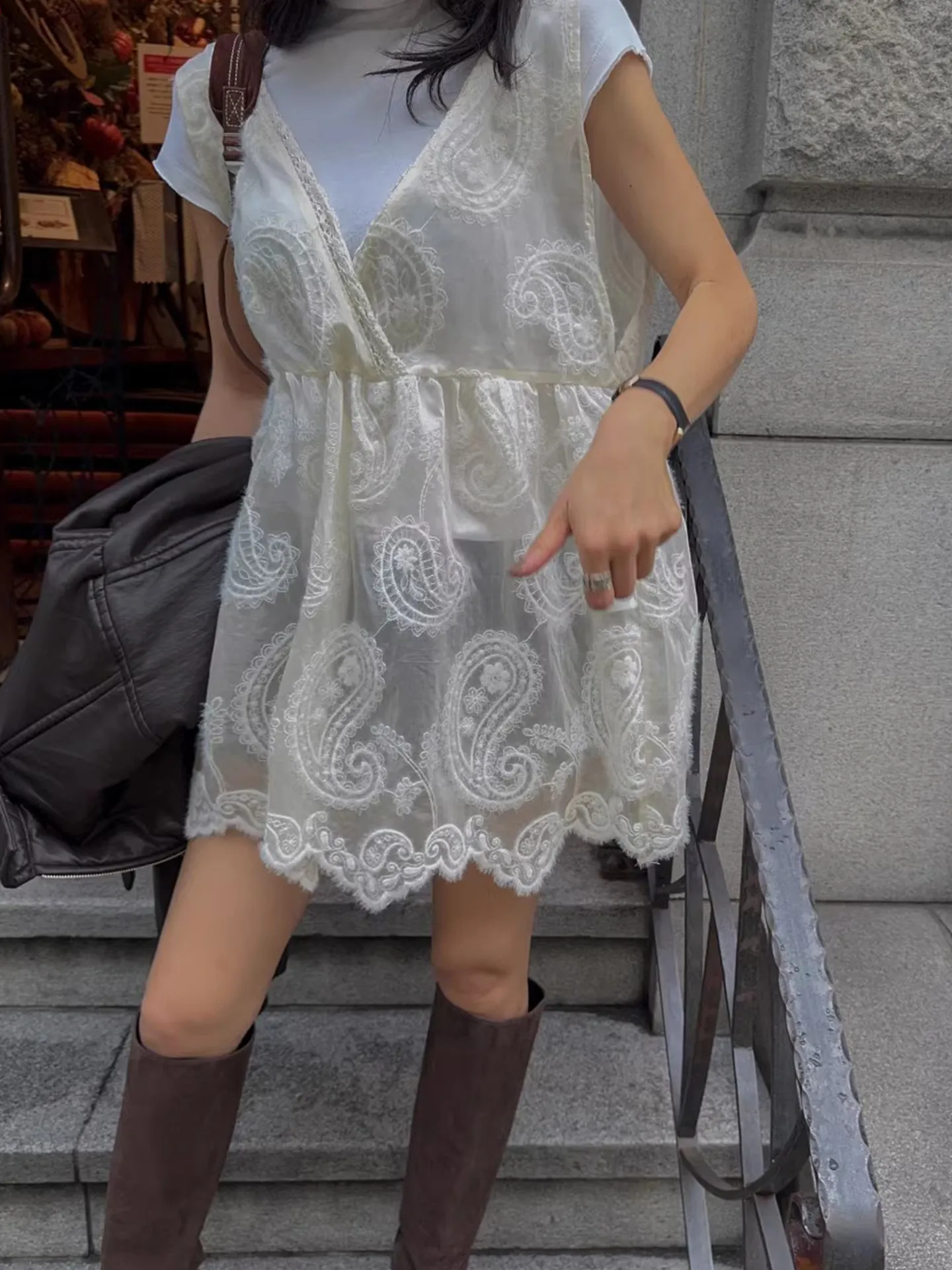 

Clothland Women Sweet White Lace Blouse V Neck See Through Sleeveless Shirt Female Cute Mini Dresses Vestido WA431