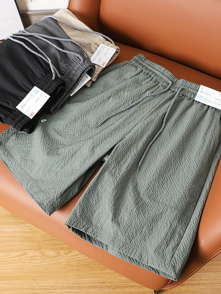 

Qui Dry Breathable Cool Feeling Bubble Cloth Men's Casual orts Elastic Waist Five Parts Summer Faion Ci Sle Thin Model