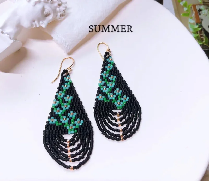 

Beaded earrings Tassel Flowers Design Originality Water drop Hand knitting Bohemia Alloy Tide Simple Rice bead earrings