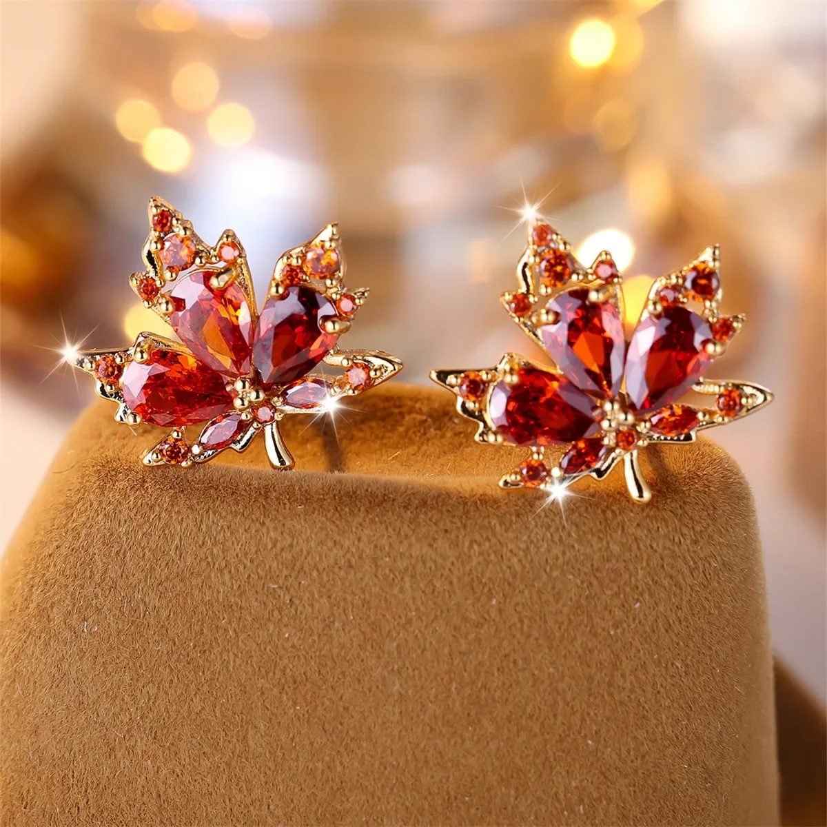 2024 New Pomegranate Red Water Drop Diamond Maple Leaf Earrings, High End Bride Wedding, Simple, Small and Versatile Earrings