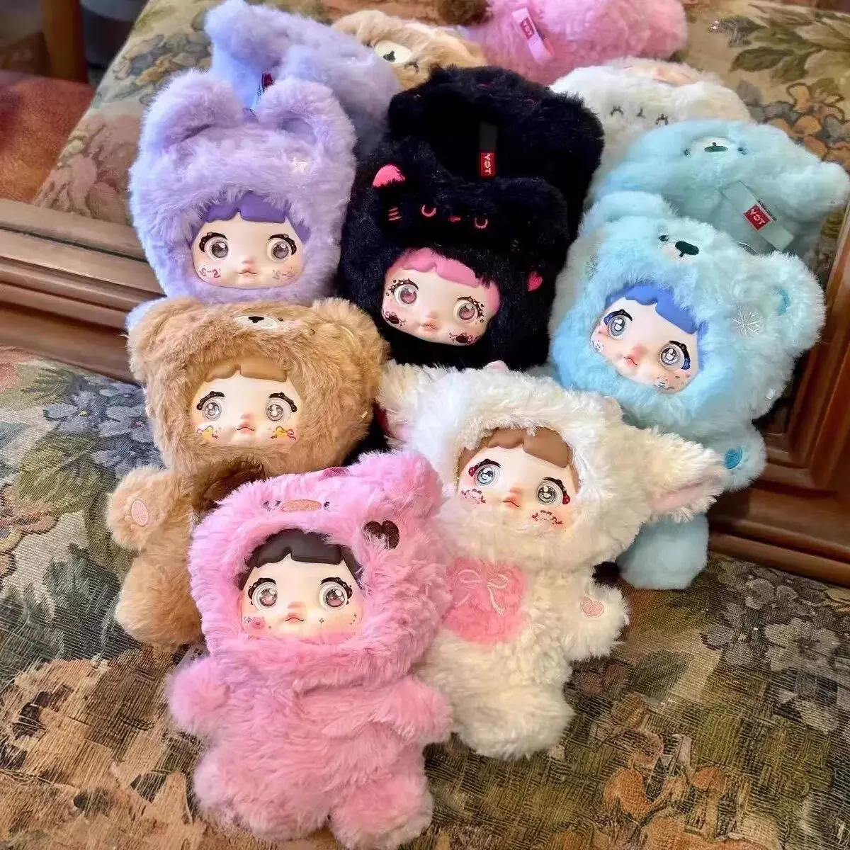 Nommi Lovelineless Never Ends Series Llavero de caja ciega de felpa con cara de vinilo, muñeca linda, dije de bolso para niñas, juguete de regalo coleccionable