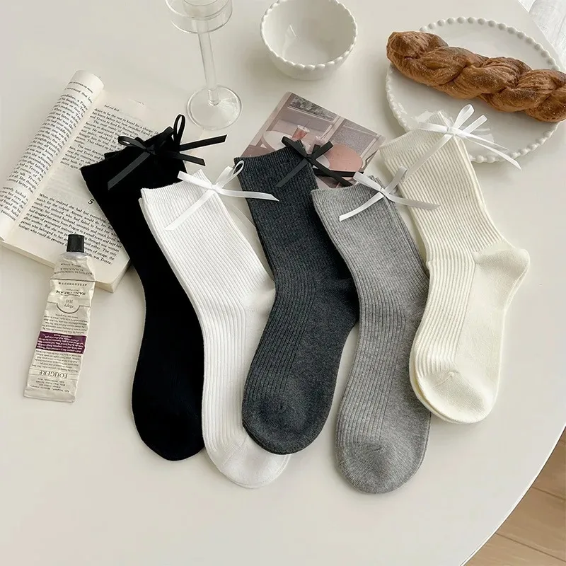 

Japanese JK Sweet Bowknot Tied Middle Tube Socks Women Heel Bow Socks Casual Black White Pile Socks Girls Sports Cotton Sock