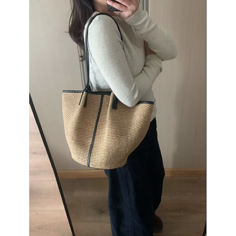

Spring and summer new travel beach niche design large-capacity tote bag, single-shoulder woven straw vacation bag for women