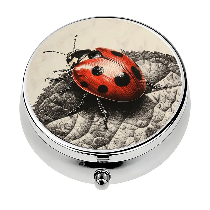 A 3-compartment ladybug-themed pill box, portable pill box, suitable for putting in a purse or handbag