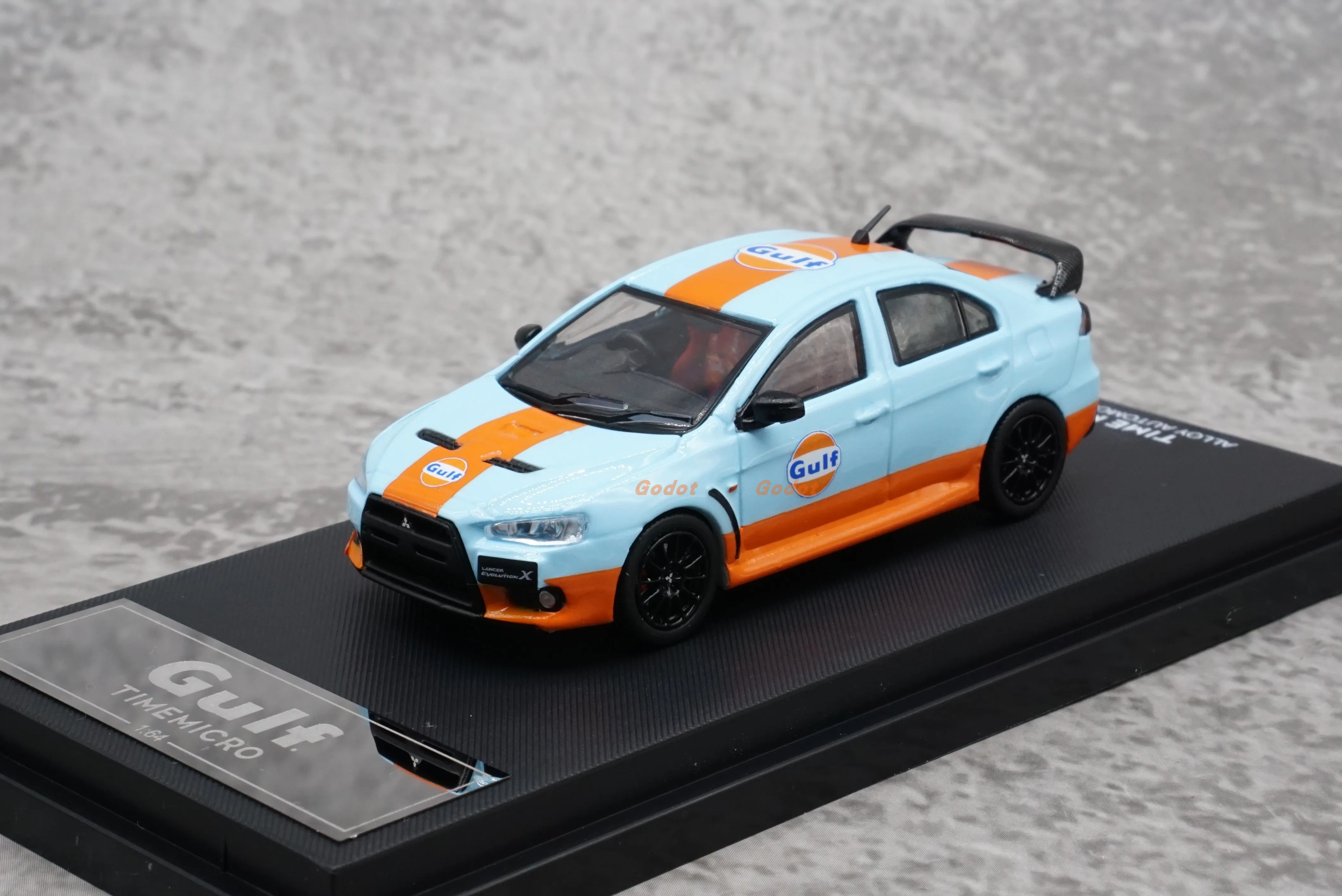 

Игрушечная модель автомобиля TM 1/64 EVO из сплава персика