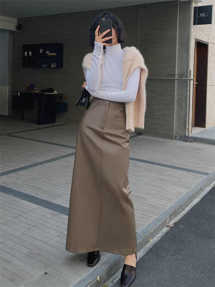 

2025 Autumn New Mid to Long Leather Skirt Women High Waist and Slim Fit Split A-line Hip Wrapping Half Body Skirt