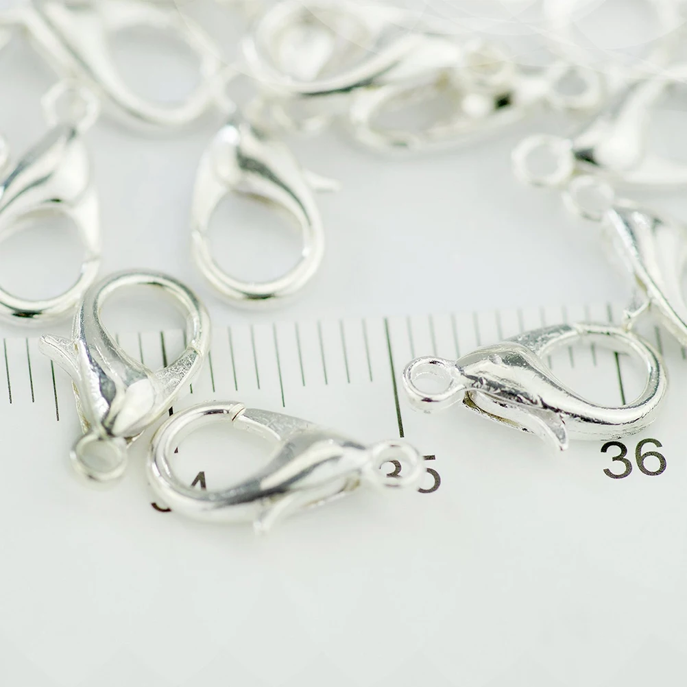 

100Pcs 7x12mm Lobster Claw Clasps Silver Tone Curved Connectors Easy Fit for Chains Jump Rings DIY Jewelry Supplies