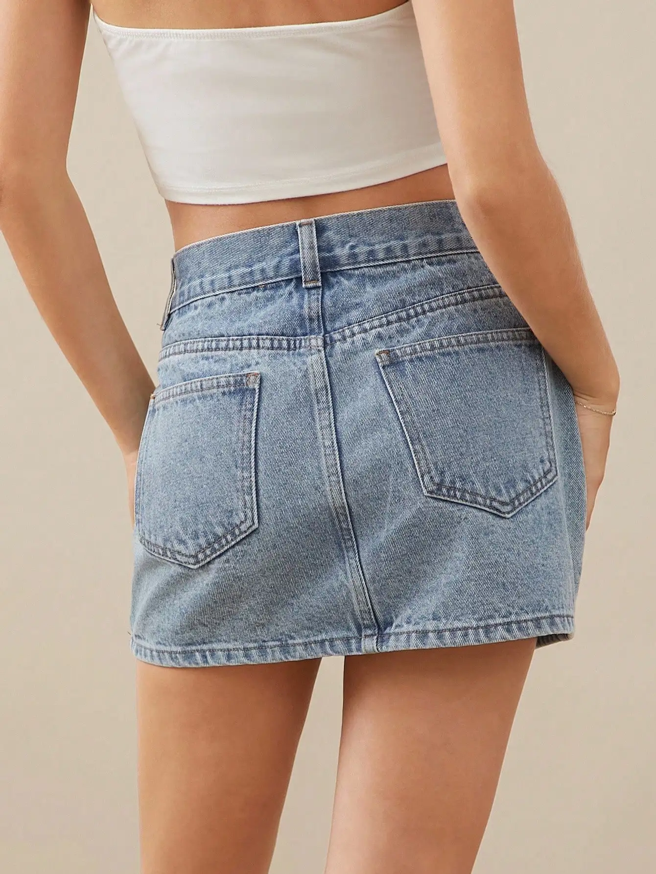 Light Wash Denim Mini Skirt with Front Button Closure and Pockets