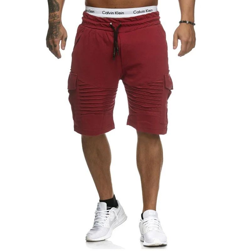Men's casual striped pocket  shorts with drawstrings, solid color, and five-point length, suitable for spring and summer sports