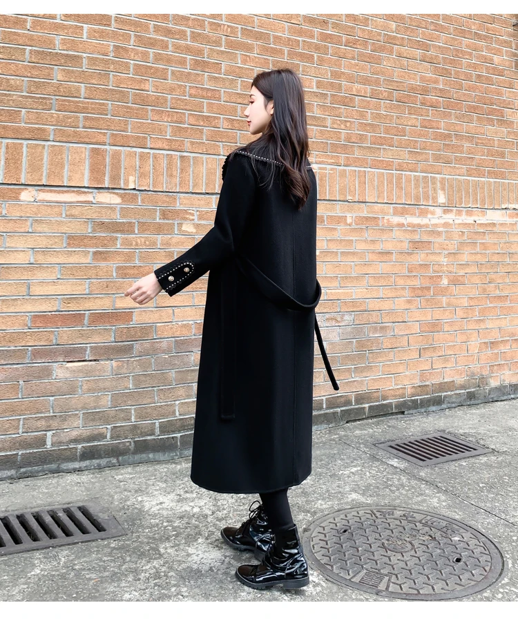 Nuevo abrigo de otoño e invierno para mujer, abrigo de lana de Cachemira de doble cara de longitud media ceñido con cintura para ir al trabajo a la moda