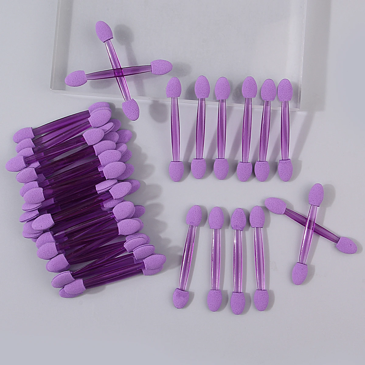 50 peças de palitos de sombra de esponja roxa de duas cabeças. As varas de esponja são purificadores/conceadores de maquiagem de olhos reutilizáveis