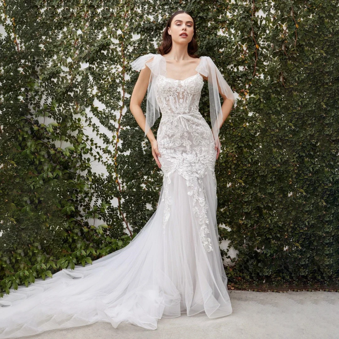 

Luxurious Lace White Mermaid Brides Wedding Dresses Elegant Women Bow Tie Spaghetti Straps Appliques Tulle Backless Bridal Gowns