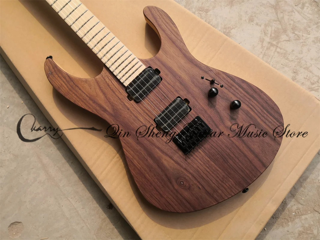 6-string electric guitar, CM guitar, maple through ash body, walnut veneer, black bridge, locking knob