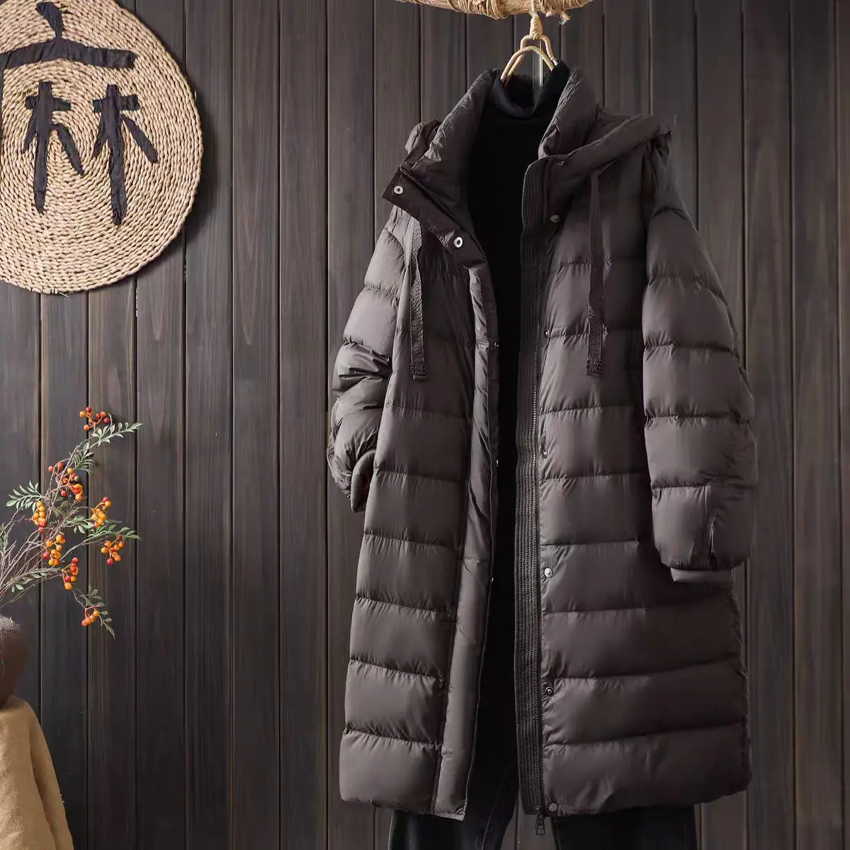 Women's hooded down jacket—warm winter outerwear featuring 90% duck down and a waist-cinching, slimming fit.NO.39