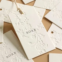 High End Customized Clothing Hang Tags Special Paper Pressure Concave Hangtags Recyclable Printing Swing Tags