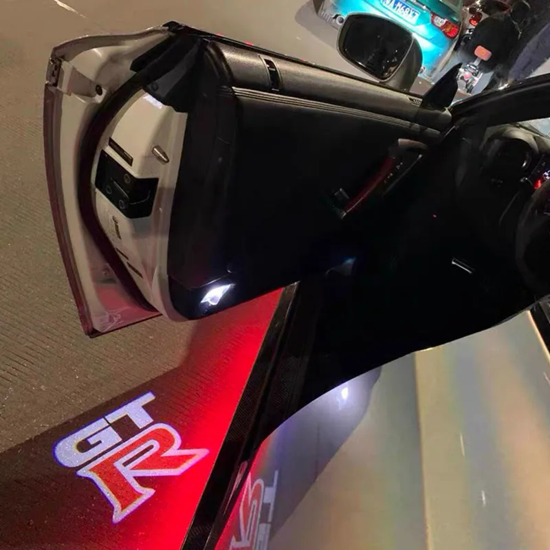 Luce a Led per auto per Nissan GTR Logo della portiera dell\'auto proiettore di cortesia luci di benvenuto per il GT-R NISMO R34 R35 accessori per