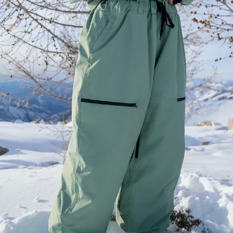 Pantalones de esquí a prueba de viento para hombres y mujeres, pantalones de esquí impermeables para exteriores, pantalones de nieve cálidos, monos