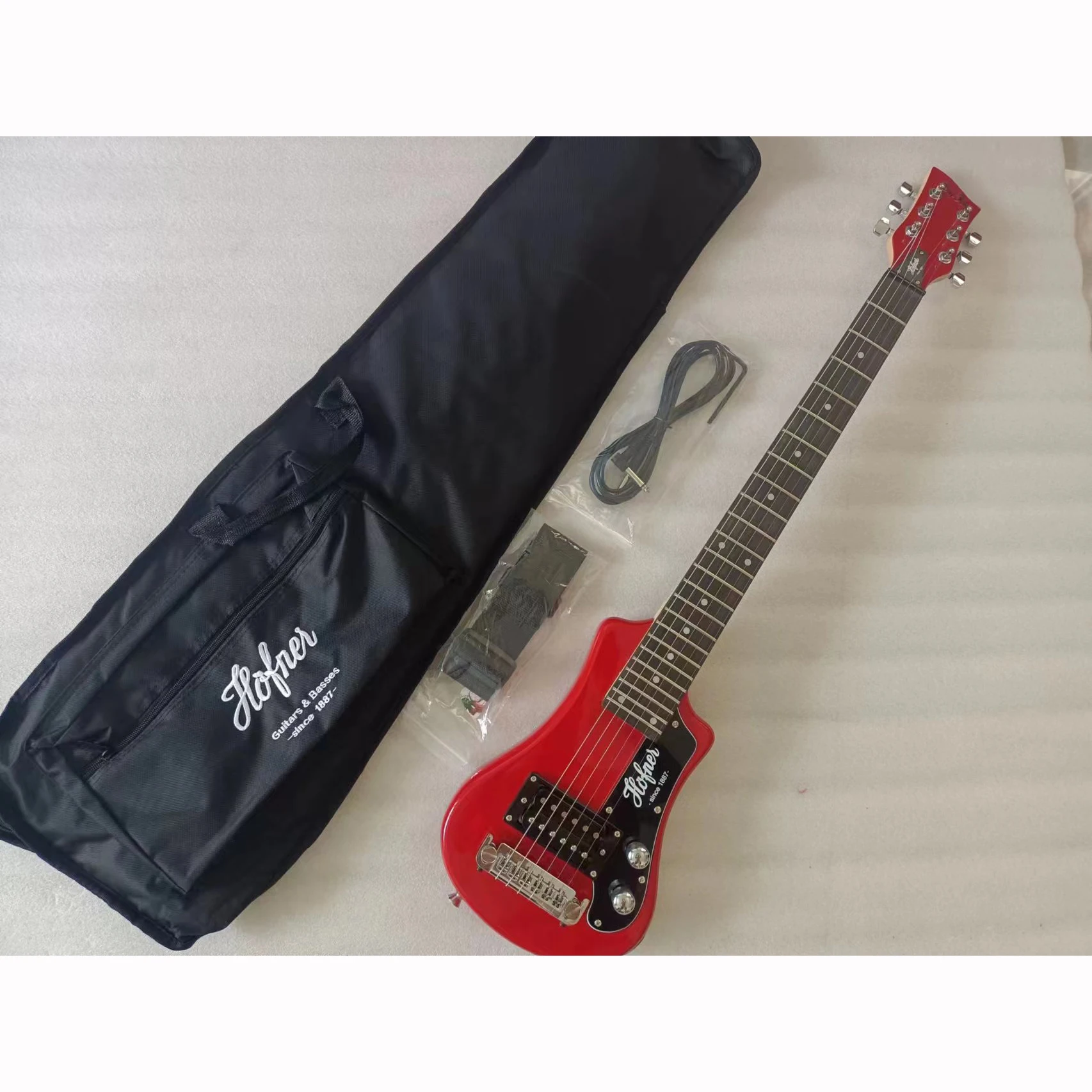 

Mini Electric Guitar with Bag, High Gloss Finish, Solid Basswood Body, Easy Taking, Travel, 6 Strings, 34 Inch, High Quality