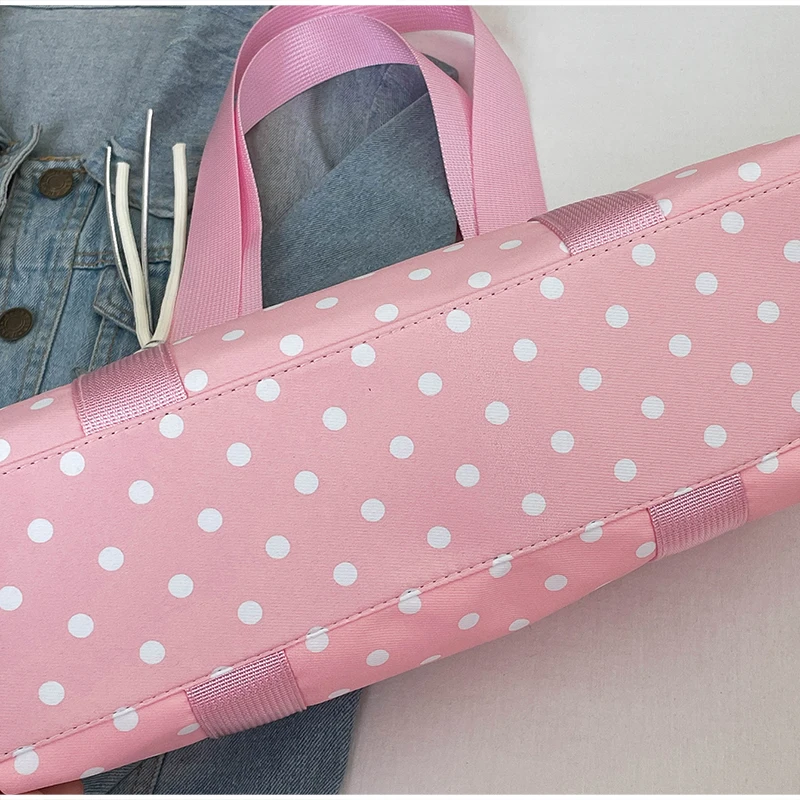 Gepunktete Schultertasche in langem Zylinderformat, Damen-Handtasche mit Tragegriff, zylindrische, leichte, schicke Tragetasche für den Arbeitsweg – Detail 2