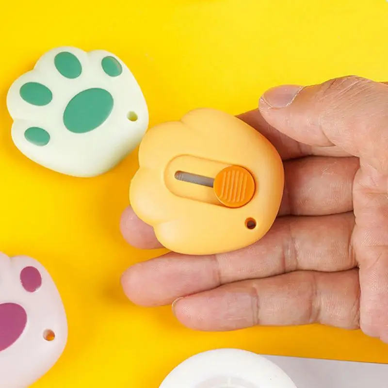 Mini pratici coltelli multiuso Kawaii Cat Paw tagliacarte buste retrattili apri coltello tascabile portatile forniture per ufficio