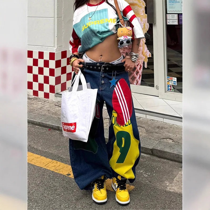 初秋の新しいスタイルの韓国の主流ストリートダンスルーズワイドレッグジーンズ、レトロプリントカーブナイフレディースジーンズ