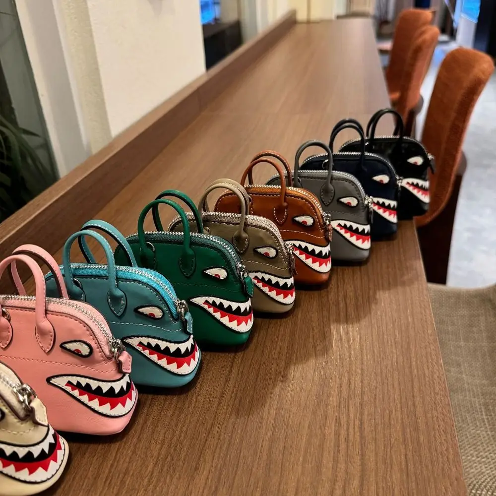 2025 الراقية حقيبة قلادة جلدية صغيرة مفتاح سلسلة الملحقات حقيبة أحمر الشفاه