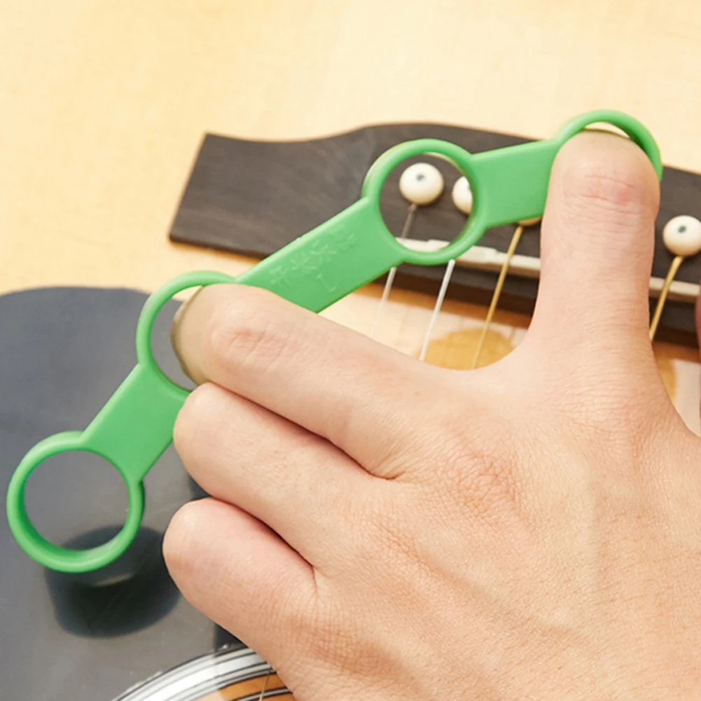 Finger Training Aid for String and Keyboard Instrument Players to Expand Reach and Build Consistent Practice Discipline
