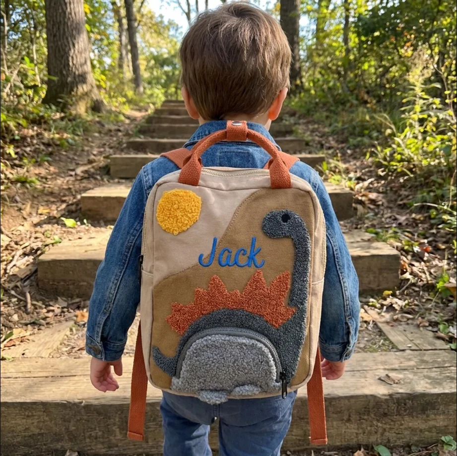 

Embroidered Dinosaur Canvas Backpack, Custom Name Bag,Personalized Kids Back to School,Gift for Dinosaur Lovers & Adventurers
