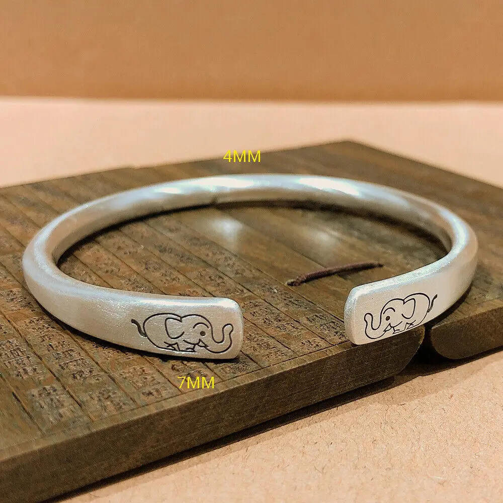 

Solid 999 Fine Silver 7mm Lovely Elephant Cuff Bangle 4mm Width 2.17inch Dia.