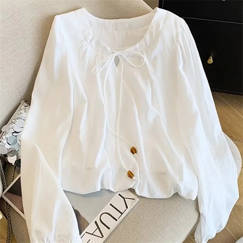 

Весенняя женская блузка-пальто однотонного цвета, осенняя модная блузка с длинным рукавом и пэчворком, корейская женская рубашка премиум-класса с круглым вырезом и завязками.