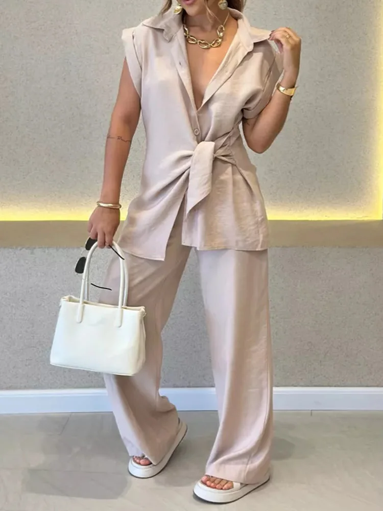 Conjuntos informales de dos piezas para mujer, traje sencillo de vacaciones con cuello vuelto, trajes holgados lisos de moda de manga corta 2025