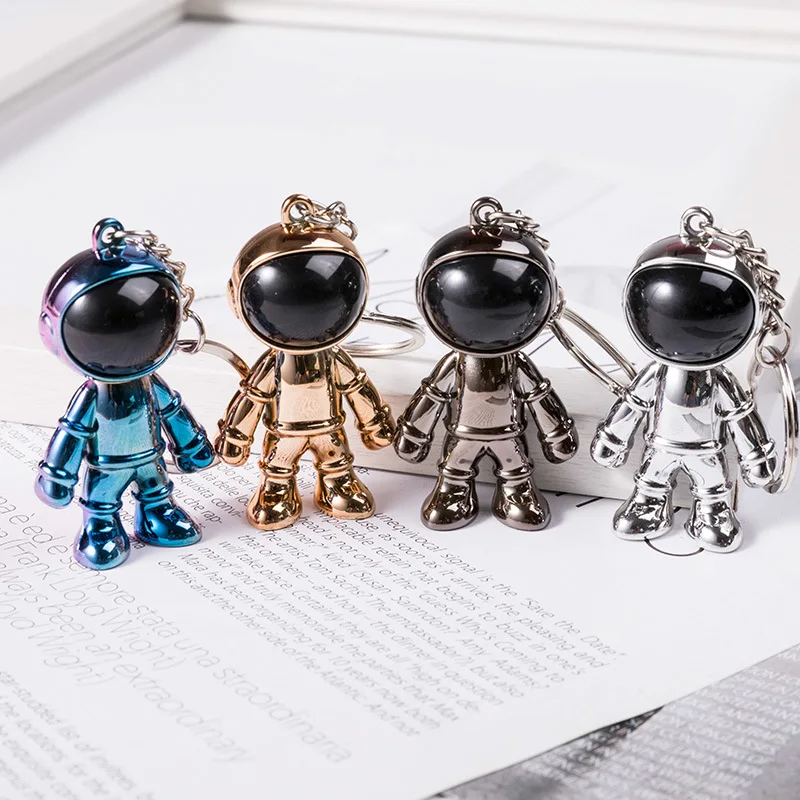 

Creative new space robot astronaut keychain schoolbag pendant boys retro personality keychain pendant Action Toy Figures