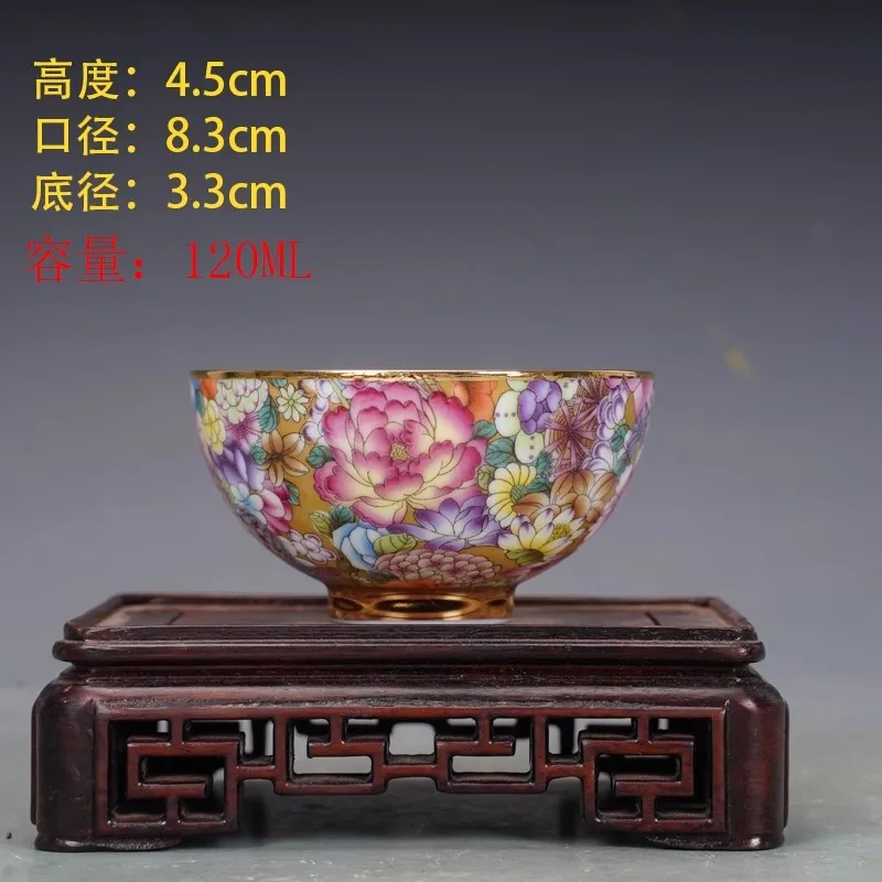 

Antique famille rose porcelain tea cup with a myriad - flower pattern from the Qing Dynasty for collection