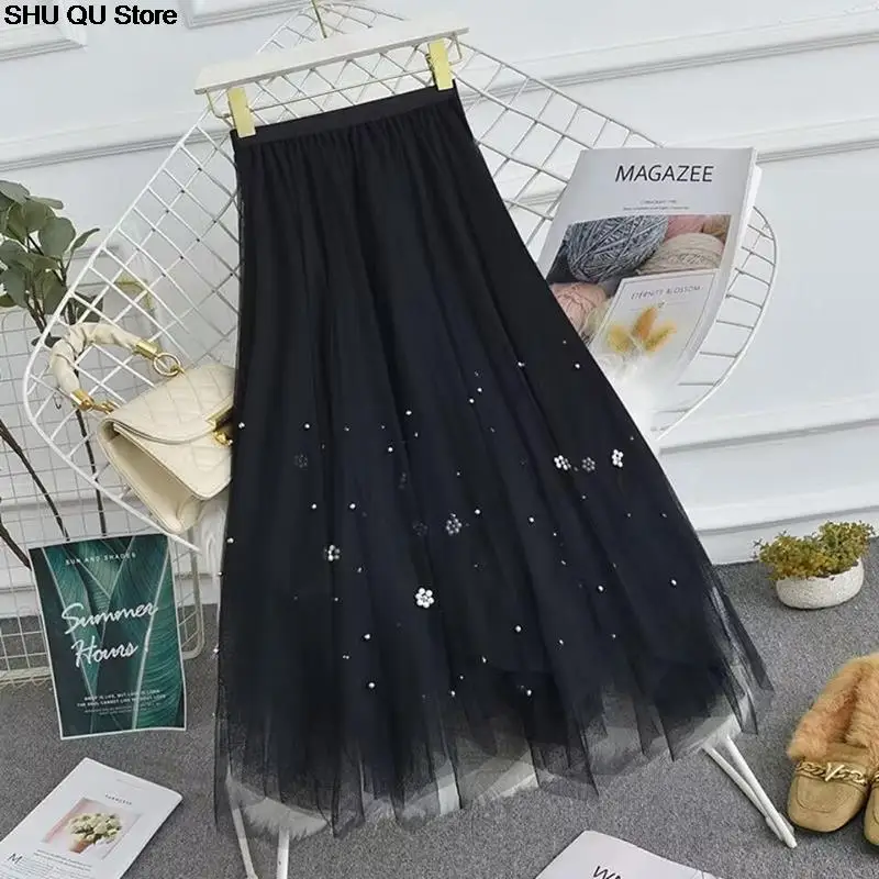 تنورة شاش مطرزة غير منتظمة جديدة لعام 2025 للنساء بخصر عالٍ تنورة عصرية تناسب الجميع على شكل حرف a متوسطة الطول بطول الإناث