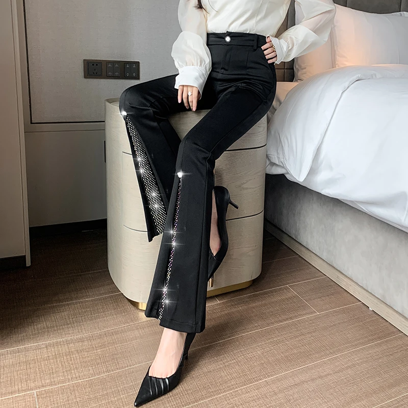 Negro Irregular Flare mujer 2025 Primavera Verano nuevo Patchwork alta cintura delgada pantalones de pierna ancha ropa de mujer pantalones sencillos