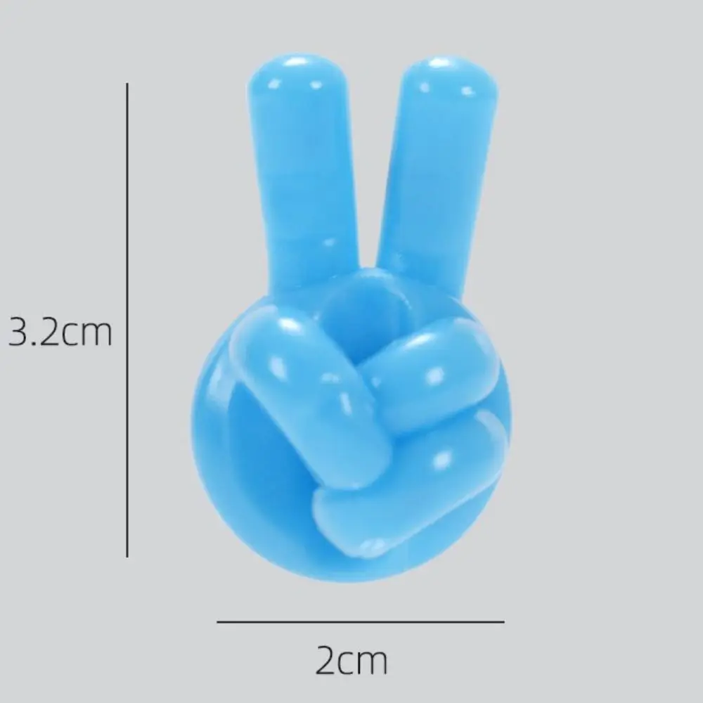 ที่เก็บสายไฟแบบติดผนัง PVC รูปนิ้วโป้ง  แบบมีกาวในตัว