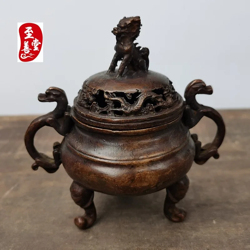 Antique-style alloy copper incense burner with a patina finish, featuring a double dragon design and double handles, suitable fo