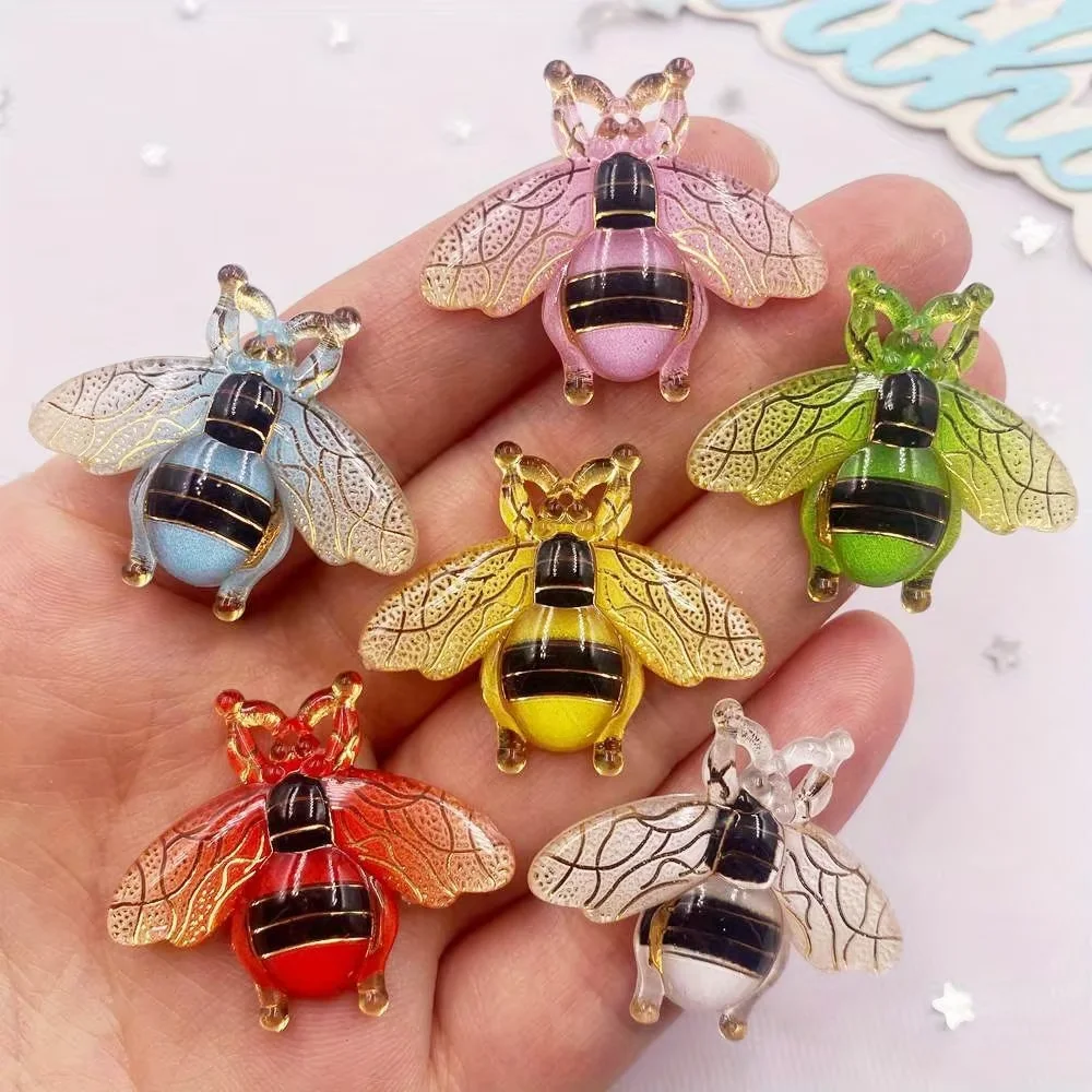8 brightly colored, glossy, bee-shaped flat-back half-beads, suitable for DIY jewelry making.