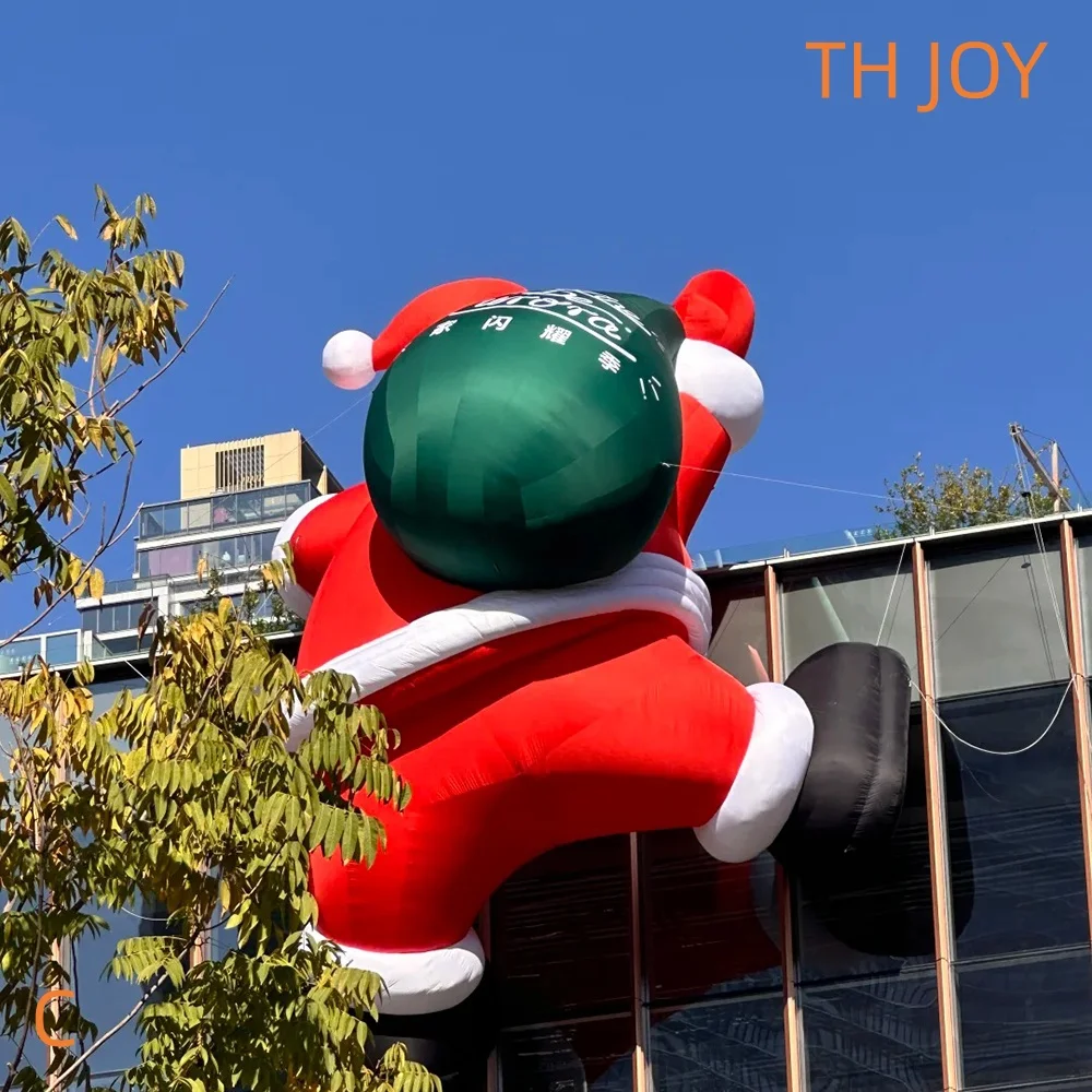 จัดส่งด่วนทางอากาศถึงบ้าน ตุ๊กตาซานตาคลอสเป่าลมสำหรับตกแต่งผนังปีนป่ายกลางแจ้ง พร้อมไฟประดับ