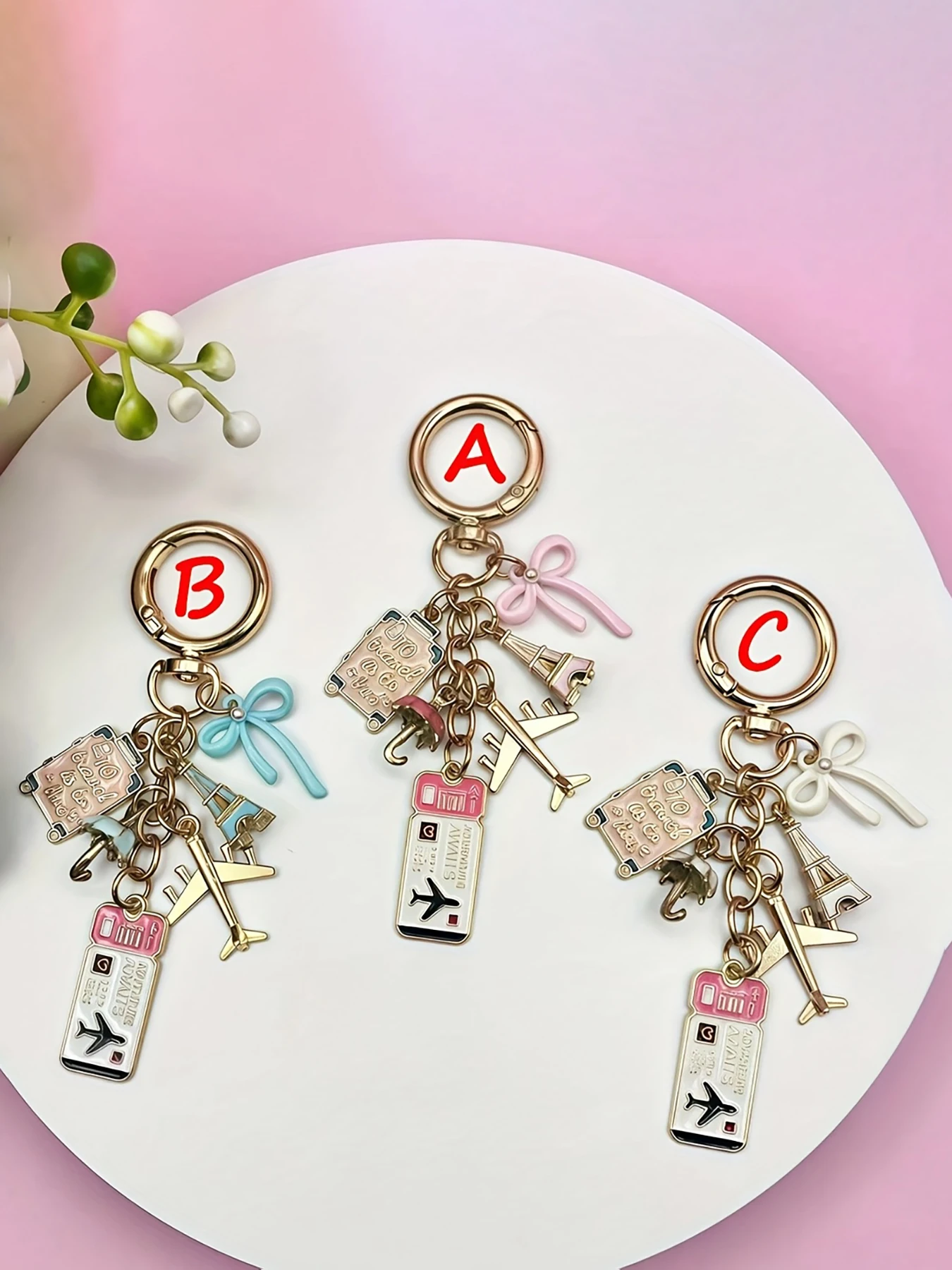 Delicate butterfly travel keychain with oil-drop airplane design, handmade suitcase, boarding pass, passport & Eiffel Tower deco