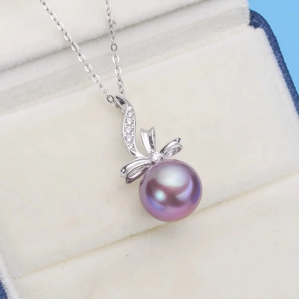 

Natural Pearl AAAA10-11mm South Sea Round Pearl Bow Pendant Necklace 18inch-925s