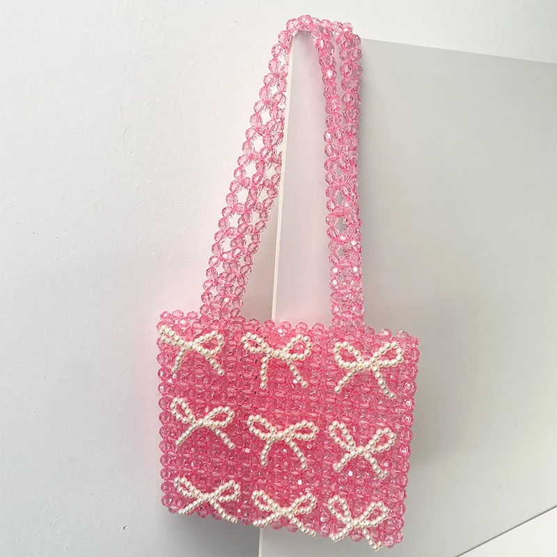 Borsa tessuta con perline acriliche rosa di nuova moda borsa a tracolla da donna con Design a fiocco di perle retrò personalizzata borsa Versatile