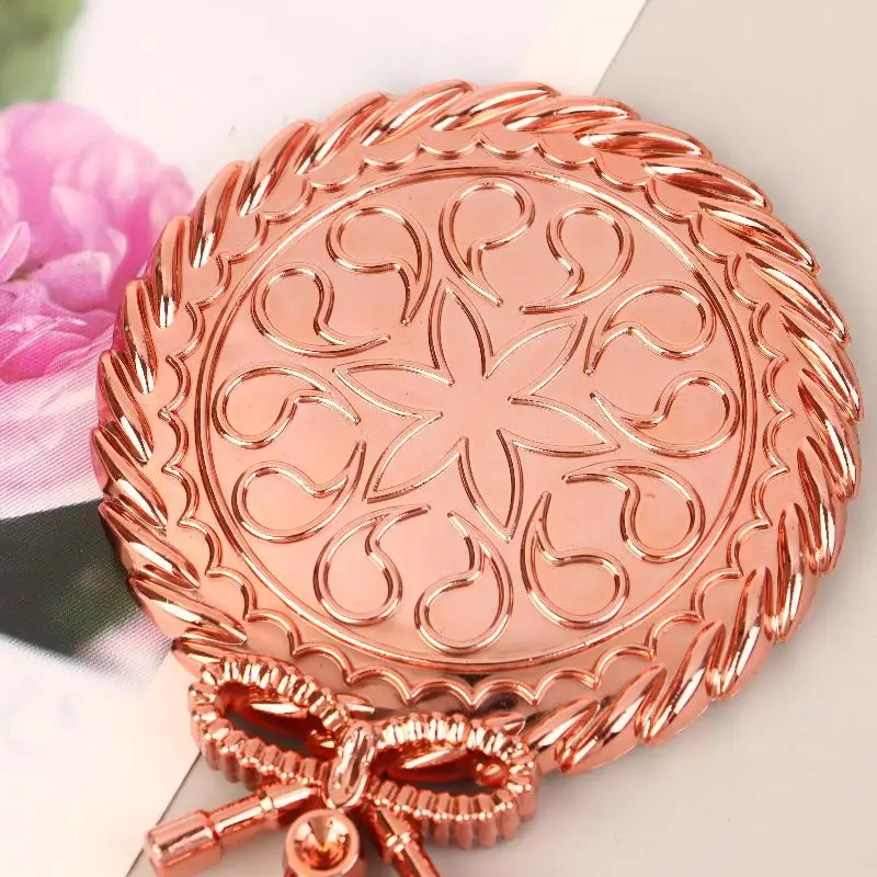 กระจกแต่งหน้าแบบมือถือ 1 ชิ้น พร้อมโบว์ กระจกแต่งหน้าทรงกลมแบบพกพา สไตล์ยุโรป หรูหราแบบราชสำนักโบราณ