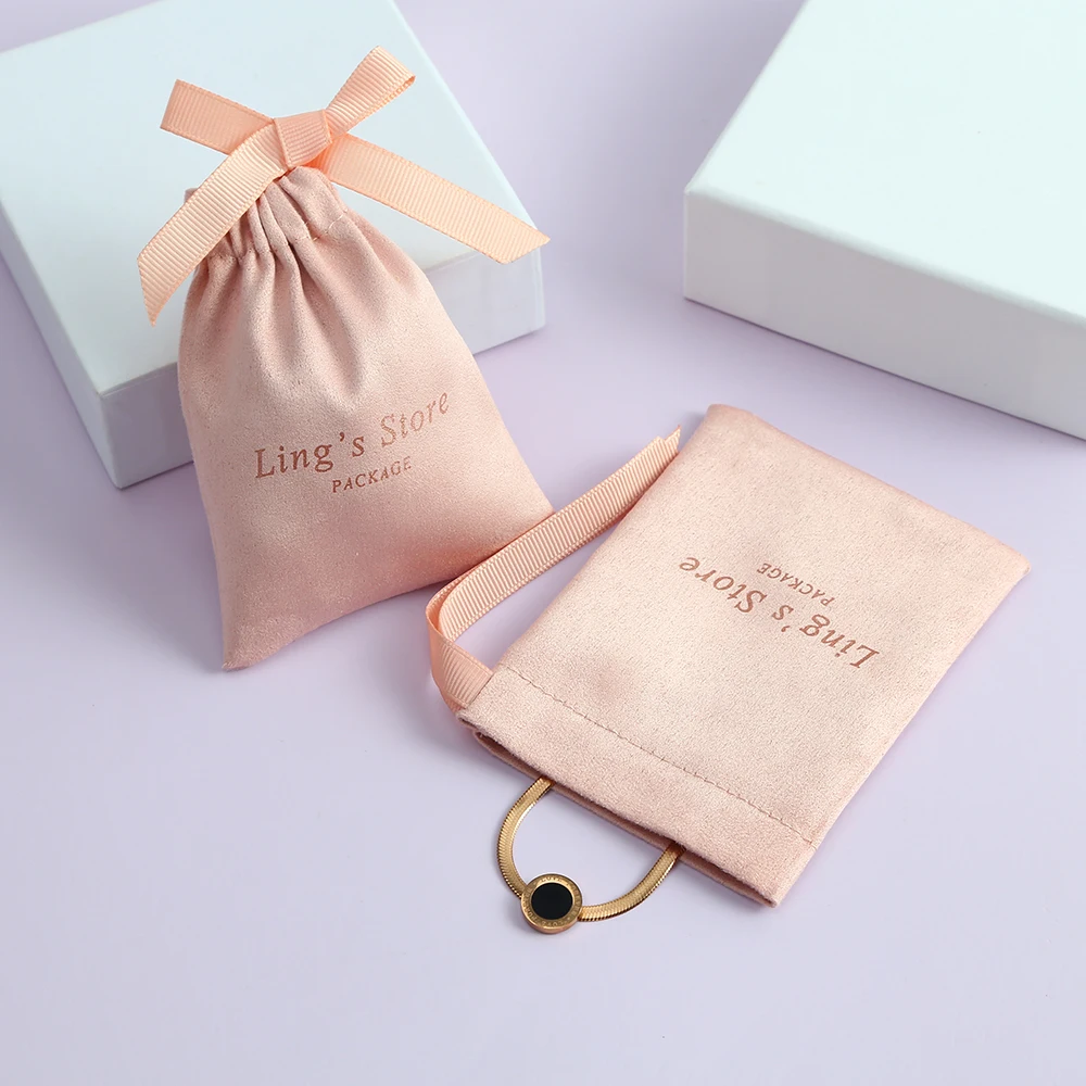 Borsa in flanella per gioielli rosa con logo personalizzato da 100 pezzi con nastro in gros-grain su un lato per custodia per orecchini portachiavi, anelli, custodia per imballaggio