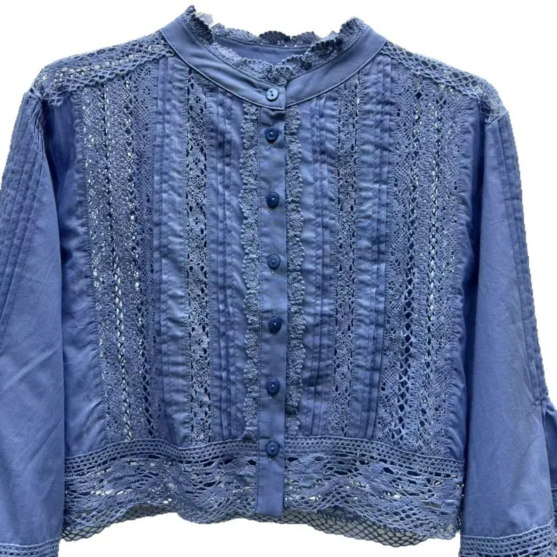 In the early autumn of 26 years, the new lace hollowed-out crochet inlaid lace horn-shaped loose and versatile shirt women